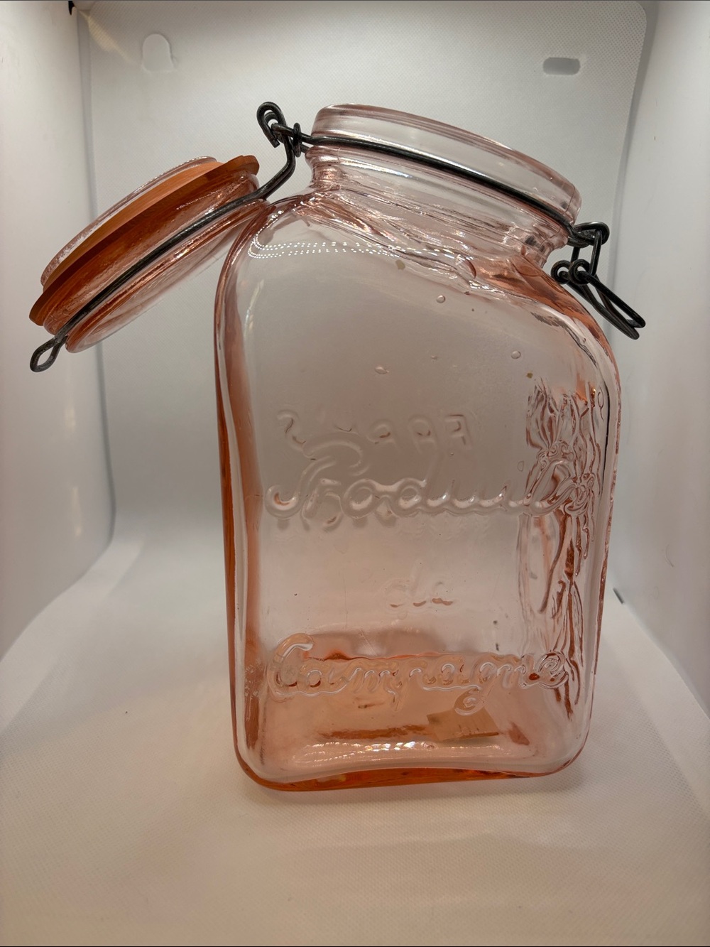 Vintage Italian pink glass farms product storage jar.